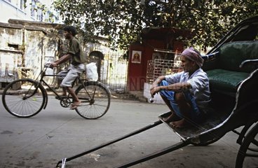 Rickshaw and cycle on the streets of Calcutta India