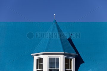 Blue roof of a hotel in Gaspe Quebec Canada