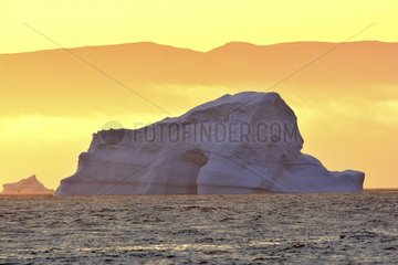 Denmark. Greenland. West coast. Sunset on an iceberg in the straight of Vaigat  near the village of Saqqaq.