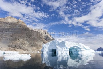 Rocky shore and iceberg - Scoresby Fjord Greenland