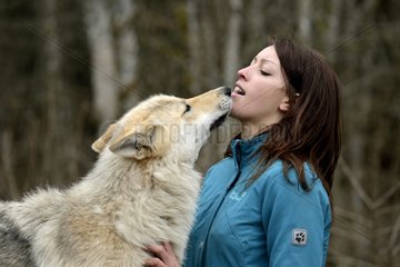 Woman and Czechoslovak Wolf-Dog - France