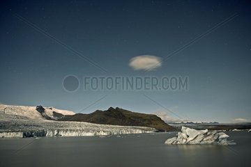 Aurora borealis on an iceberg with Joekulsarlon in Iceland