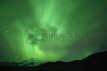 Aurora borealis over a glacier Joekulsárlón Iceland