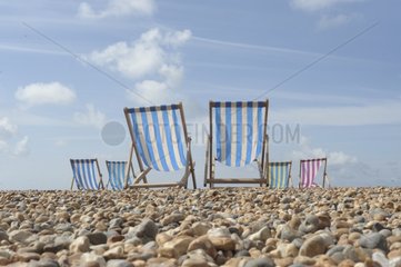 Deckchairs on the beach in Brighton UK