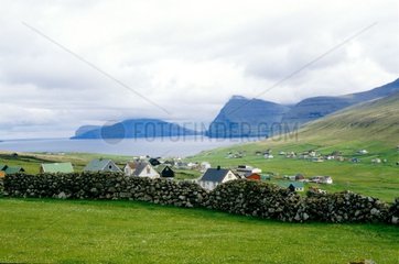 Stone wall in edge of a village Faroe Islands