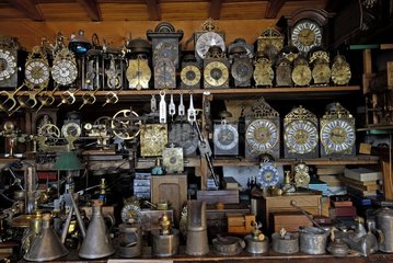 Collection of old clocks on racks France
