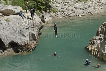 Group of canyoning jumping in the Verdon France