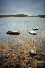 Quiet water of Loch of Cliff Unst Island Shetland