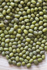 Mung beans in a wooden bowl