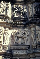 Frontage of a temple carved of naked figurines Thailand