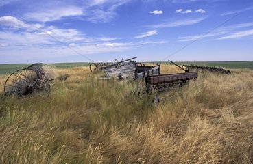 Agricultural machinery and abandoned barn Saskatchewan Canada