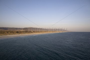 Blue sky on the coastal landscape of the Sea of Oman