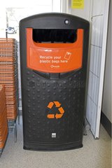 Bin for recycling used plastic bags in a supermarket UK