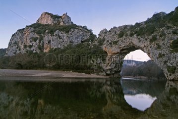 Natural arch in the Gorges of Ardèche at dusk France