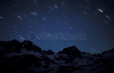 Chain of the Pyrenees atnight under star rain France