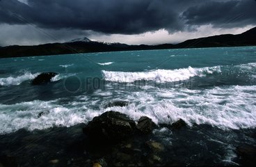 Shore of Lago Pehoe under stormy sky Chile