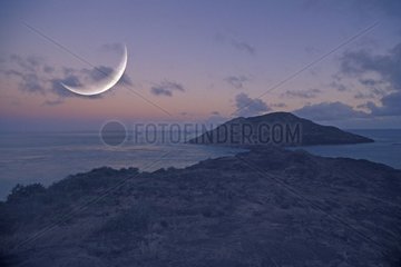 Crescent moon at the end of the Cape York Australia