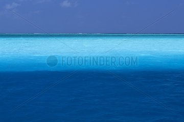 Blue waters of the Male lagoon in the Maldives