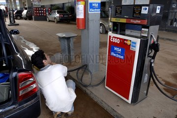 Service station delivering the fuel containing alcohol