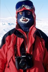 Photographer with mask of white frost Beechey Island Arctic