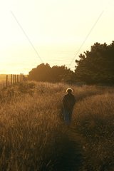 Man walking in the countryside California USA