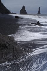 Black sand beach and volcanic rocks Reynir Iceland