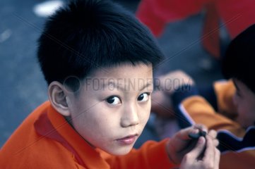 PortrÃ¤t eines jungen chinesischen Jungen mit Kanton