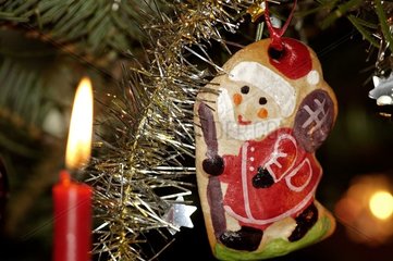 Decorated Christmas tree and candle in Germany