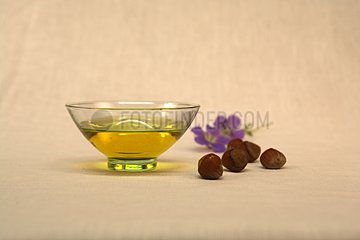 Oils of care for the face in a bowl