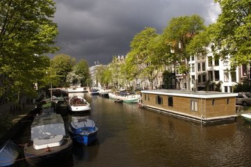 Channel and boats in Amsterdam Netherlands