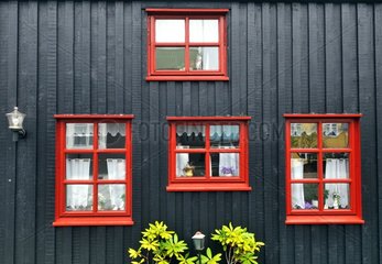 Traditional house with red windows Faroe Islands