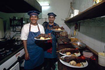 Vorbereitung der Guineabigs in einem Restaurant Peru