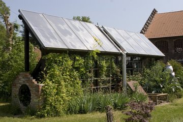 Solar panels in a garden for hot water France