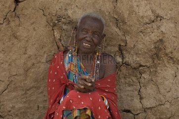Masai against the wall of his hut in Meru National Park Kenya