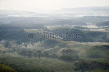 Air shot of the Moselle countryside in the fog France