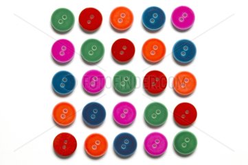 Buttons of colors to 2 holes in square