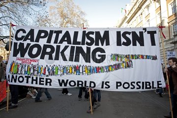 Campaigners with banner on Climate Change March London
