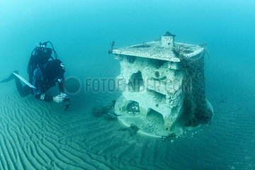 Scuba diver in front of an experimental artificial reef micro (xreef)  Marine Protected Area of the Agathoise coast  Herault  France