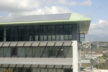 HQE building with solar panels and shading France