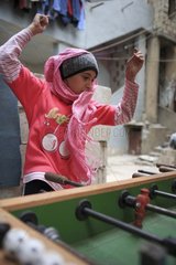 Palestinian girl playing in the camp of Sabra Lebanon