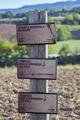 Signpost of the Bard Source and the Fairy Chimney Trail in the Valley of the Saints. Auvergne  France