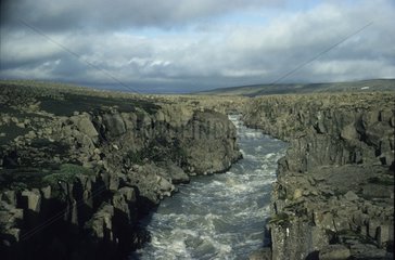 Kaldakvisi River cutting through a basaltic flow in Iceland