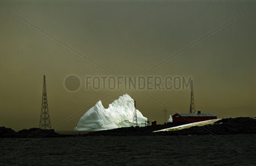 Iceberg drifting to the outskirts of the Melchior Antarctic base  Argentina  Antarctic Peninsula.