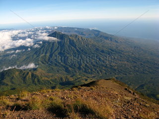 View of Batur volcano from the summit of Agung volcano  Bali island  Indonesia.