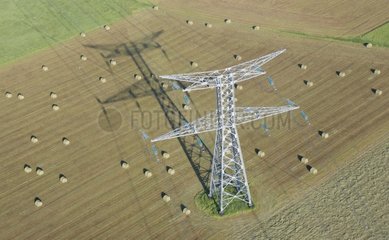 Air shot of an electric post among the cultures France