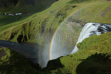 Rainbow over Skogafoss waterfalls  Iceland