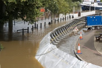 Flood barrier along the flooded River Severn in Upton UK