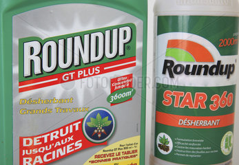 Glyphosate (Roundup) weed killer bottles in studio  France
