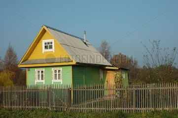 Russian traditional house behind a fence Russia