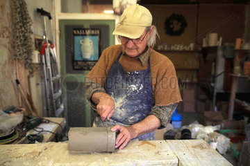 Potter working a piece of clay  Martine Gilles and Jaap Wieman  Village of Brantes  Provence  France